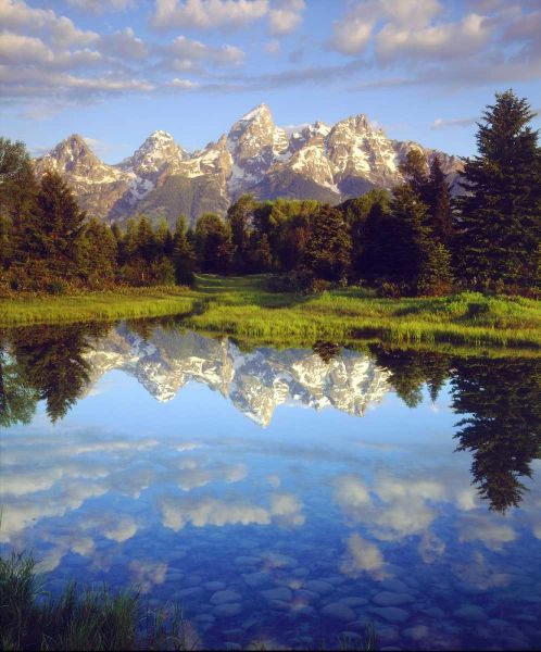 Wyoming Grand Tetons reflect in the Snake River